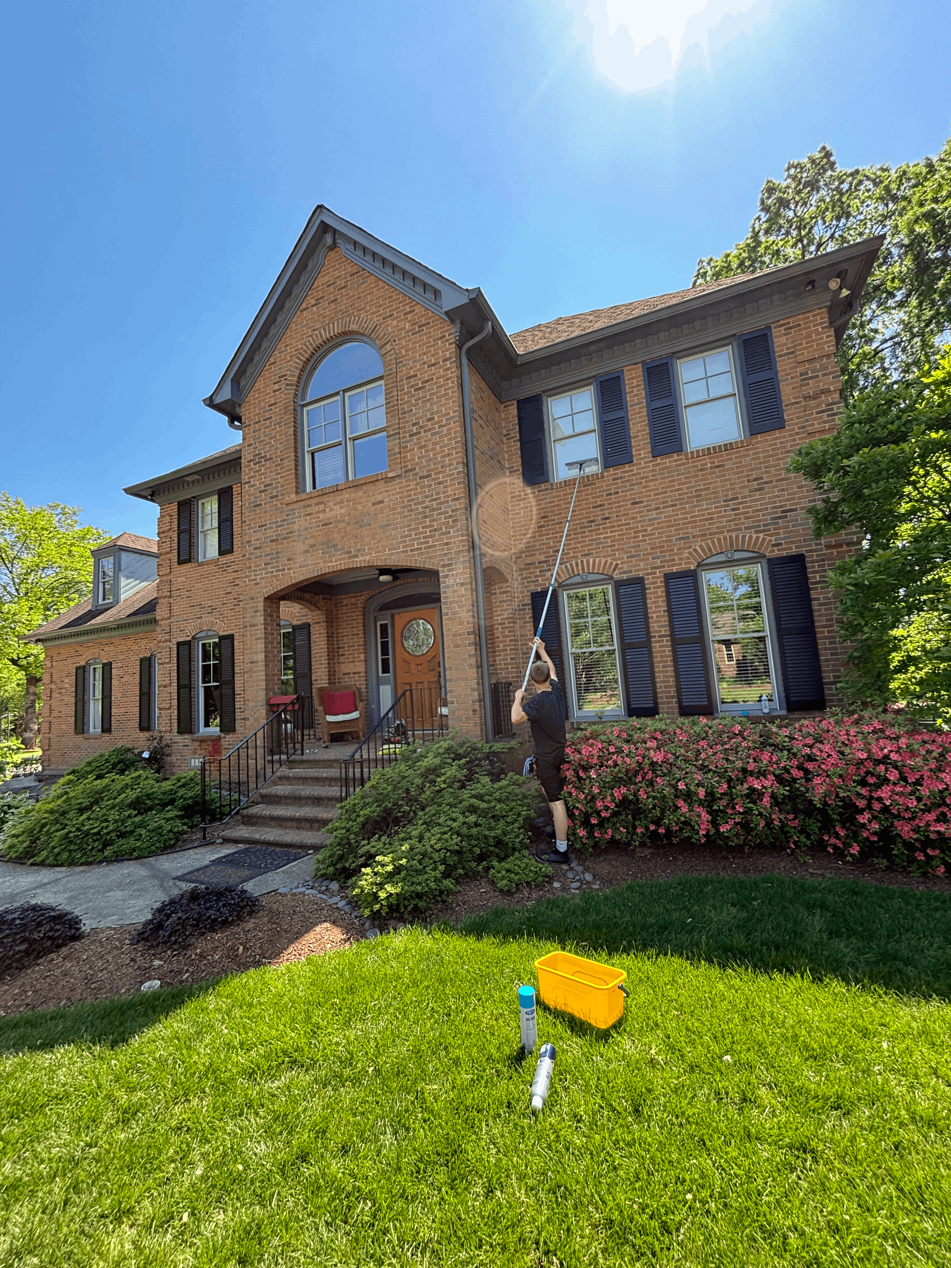 Exterior cleaning at front elevation of a home